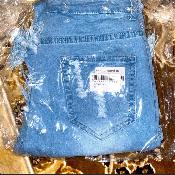 Ripped Bell Bottom Jeans (New Arrivals) - Picture 7 of 8